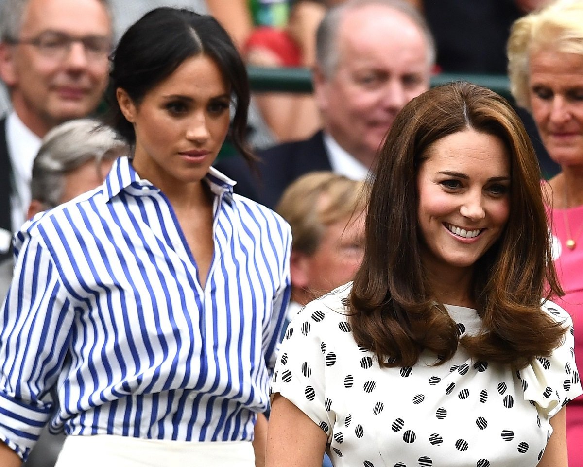 Meghan Markle and Kate Middleton attend day twelve of the Wimbledon together in 2018