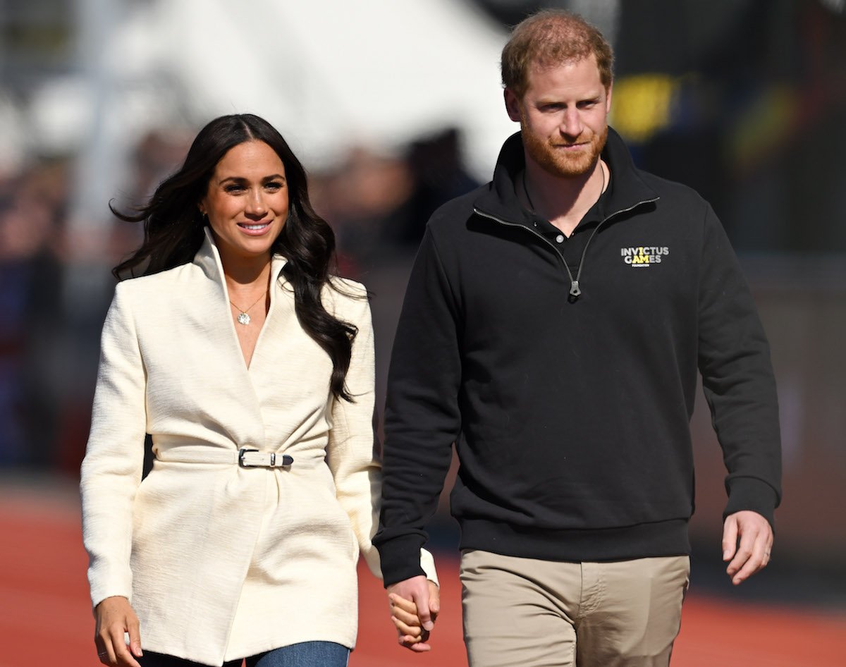 Meghan Markle and Prince Harry, who shared eye-opening quotes about their relationship in Netflix's 'Harry & Meghan', hold hands at the 2020 Invictus Games