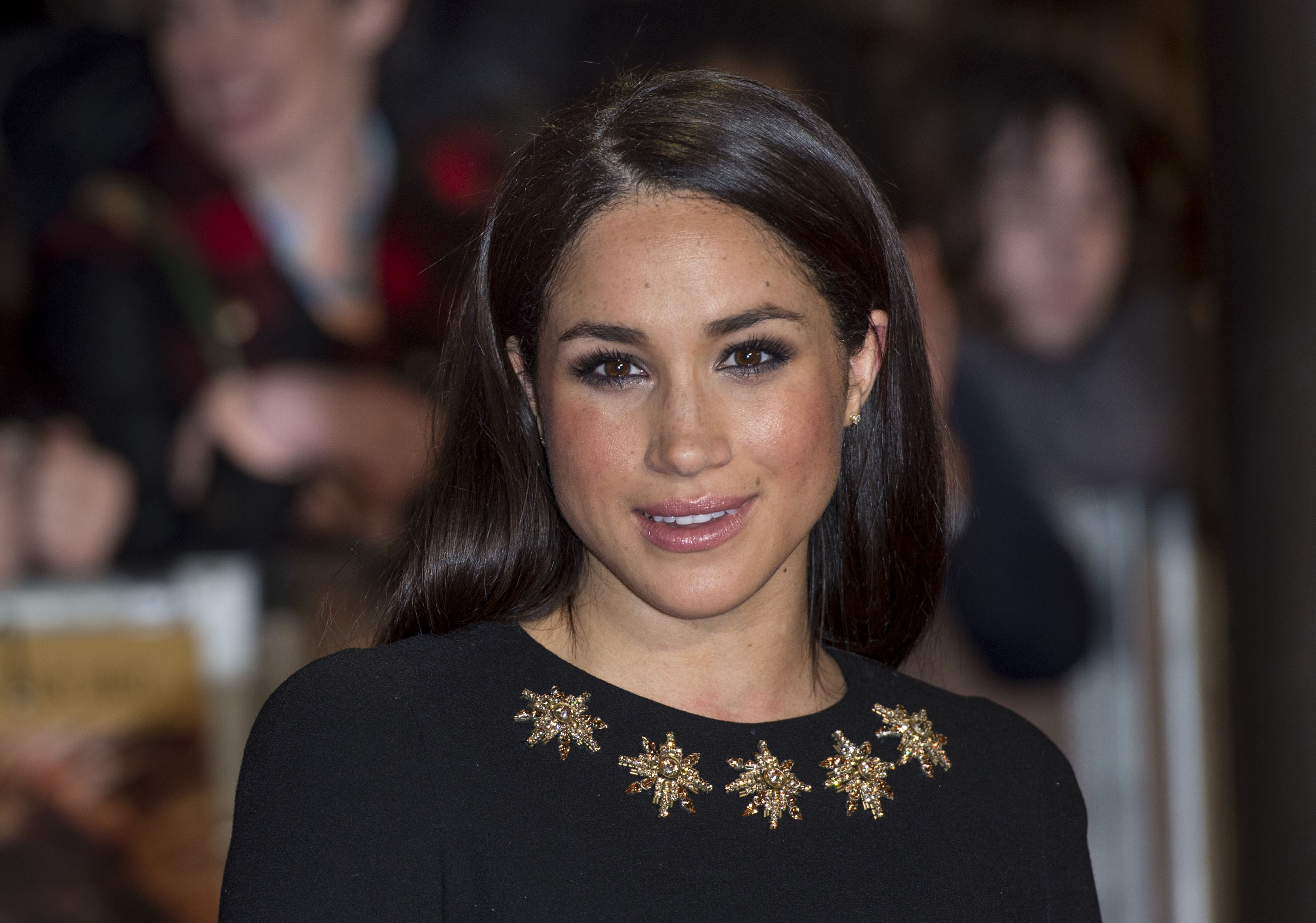 Meghan Markle attends the premiere of The Hunger Games: Catching Fire.