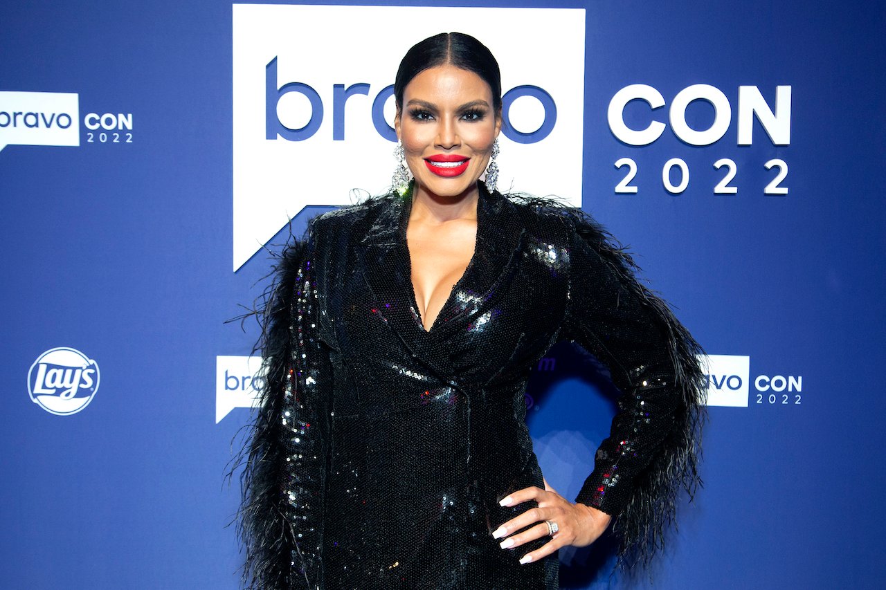 Mia Thornton poses on red carpet at BravoCon 2022