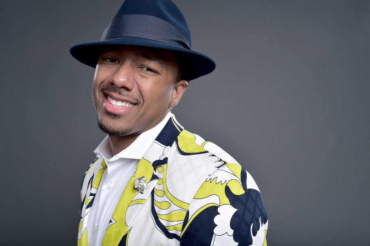 Nick Cannon smiles for photo