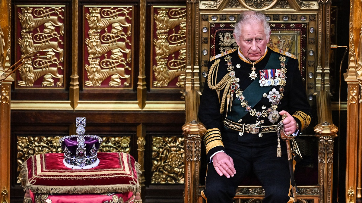 Now King Charles III sits by The Imperial State Crown in the House of Lords Chamber during the State Opening of Parliament