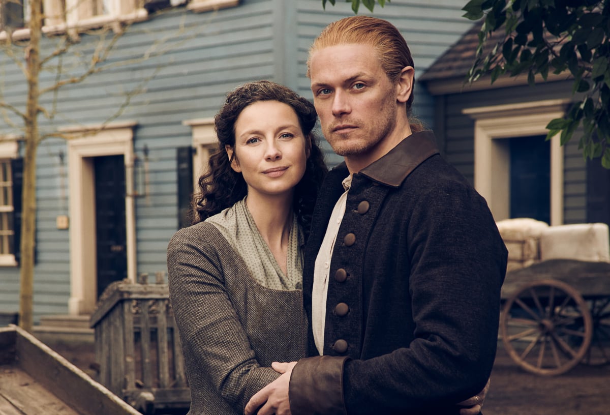 Outlander stars Caitriona Balfe (Claire Fraser) and Sam Heughan (Jamie Fraser) in an image from season 6