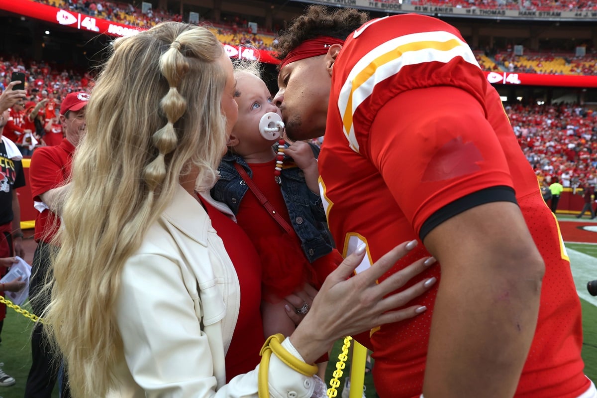 Patrick Mahomes, who has spoken a lot about fatherhood, kisses his daughter Sterling before the game against the Los Angeles Chargers