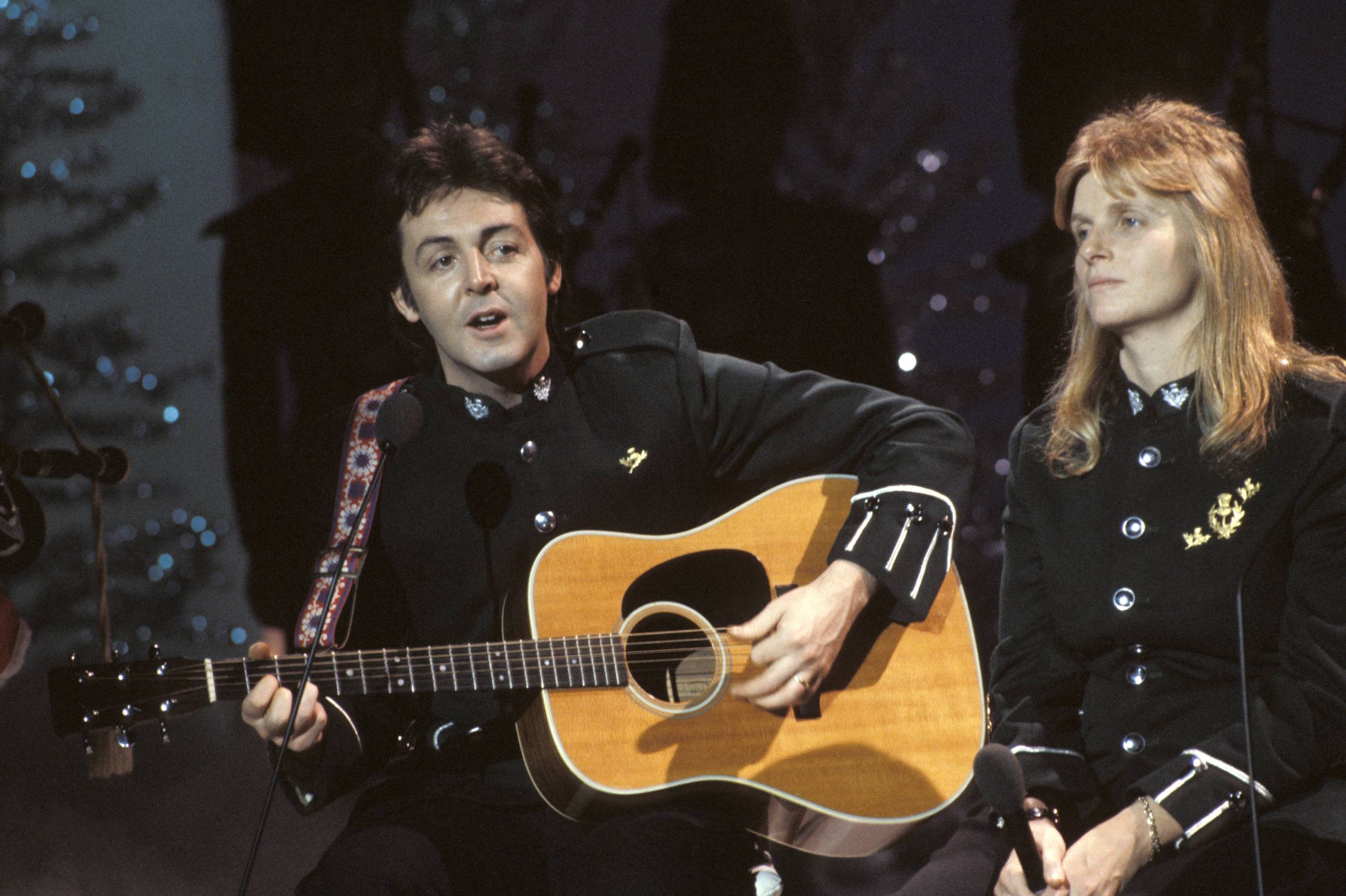 Paul McCartney and Linda McCartney perform with Wings on the Mike Yarwood Christmas Special