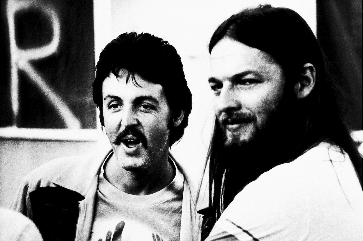 Paul McCartney (left) and David Gilmour stand backstage at the 1976 Knebworth Music Festival.