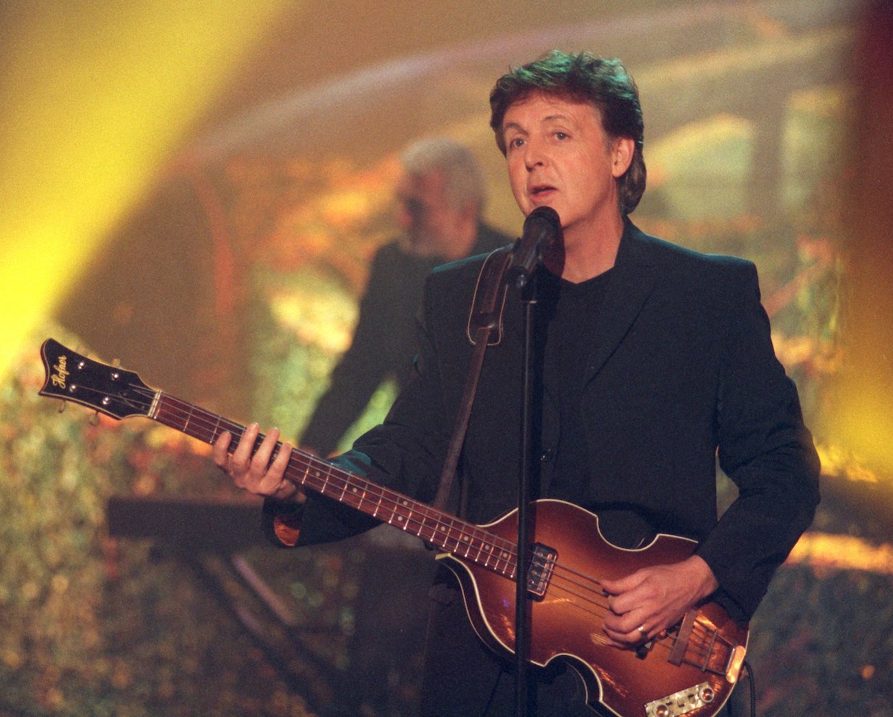 Paul McCartney performing in black in 1999.