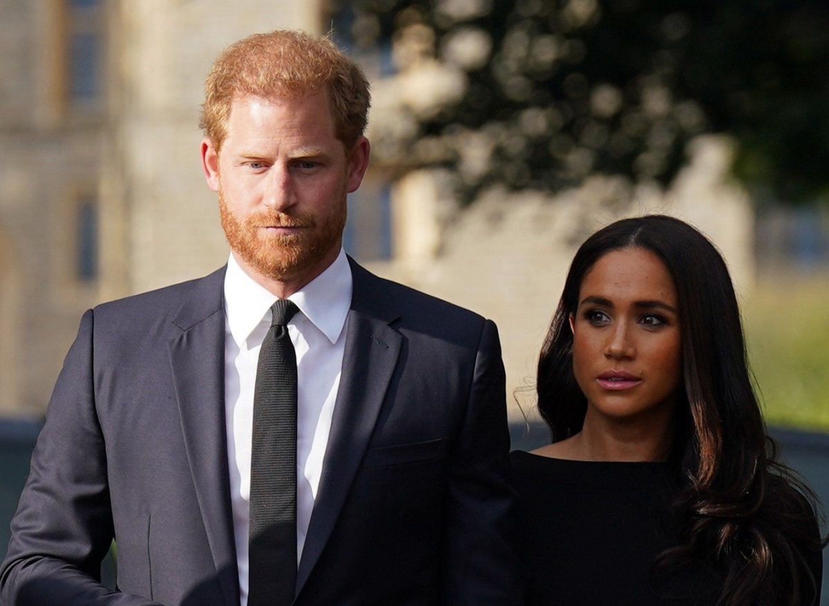 Prince Harry and Meghan Markle, who an expert says have done "everything we feared" with Netflix trailer, arrive to meet members of the public on the Long Walk at Windsor Castle