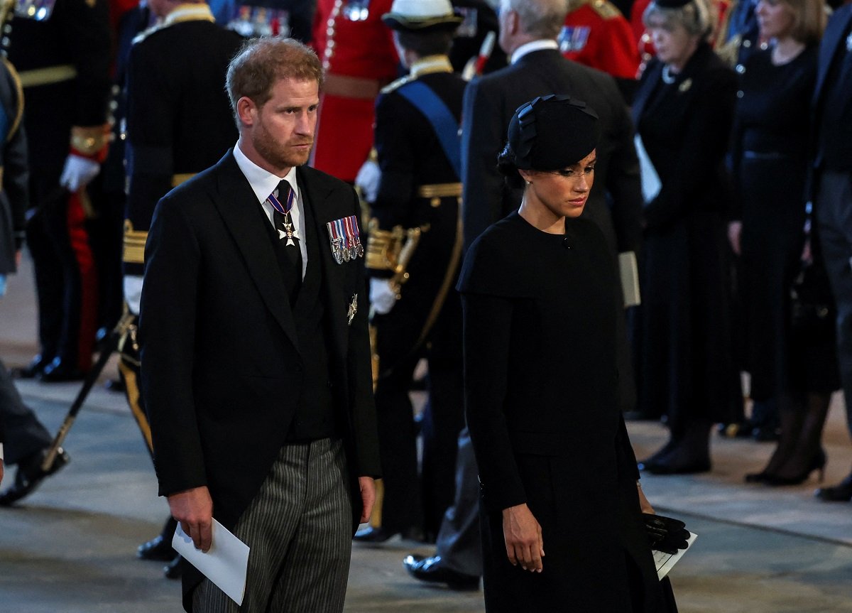 Prince Harry and Meghan Markle at The Palace of Westminster during the procession for the Lying-in State of Queen Elizabeth II