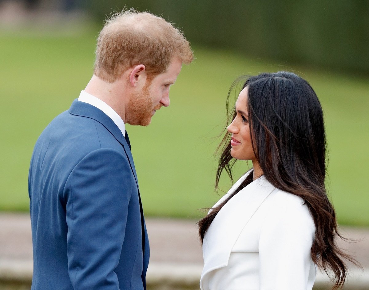 Prince Harry and Meghan Markle, who have left fans whether they met on a blind date or Instagram, attend an official photocall to announce their engagement at The Sunken Gardens, Kensington Palace in 2018