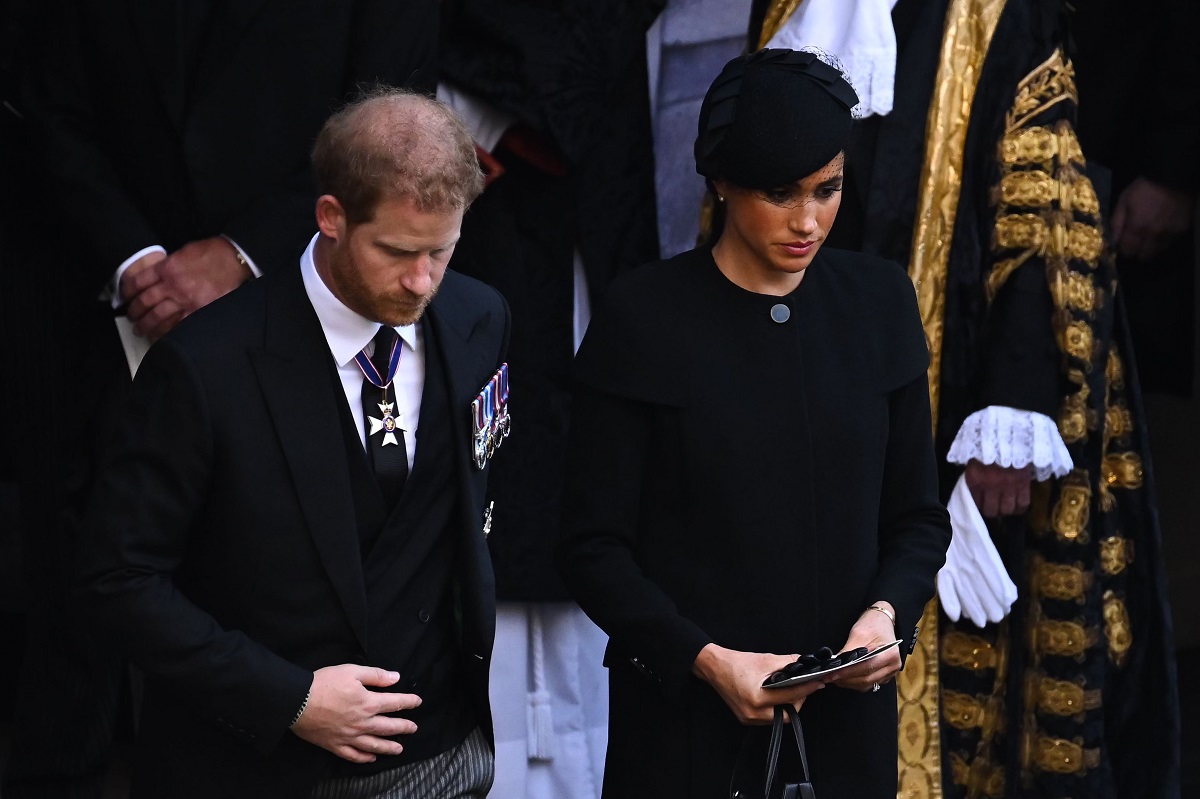 Prince Harry and Meghan Markle leave after a service for the reception of Queen Elizabeth II's coffin at Westminster Hall