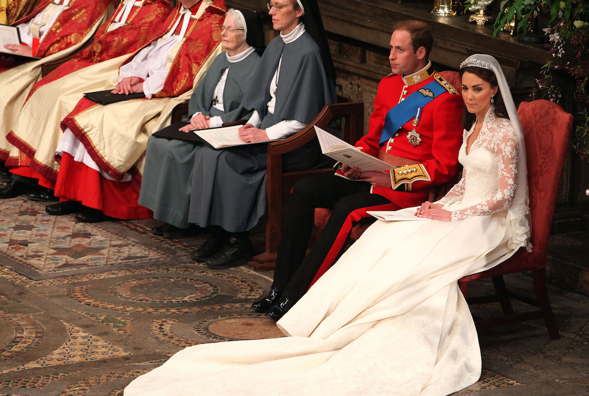 Prince Wiliam and Kate Middleton at their royal wedding in which, 10 years later, they had a similar moment at the 2021 Christmas carol concert at Westminster Abbey