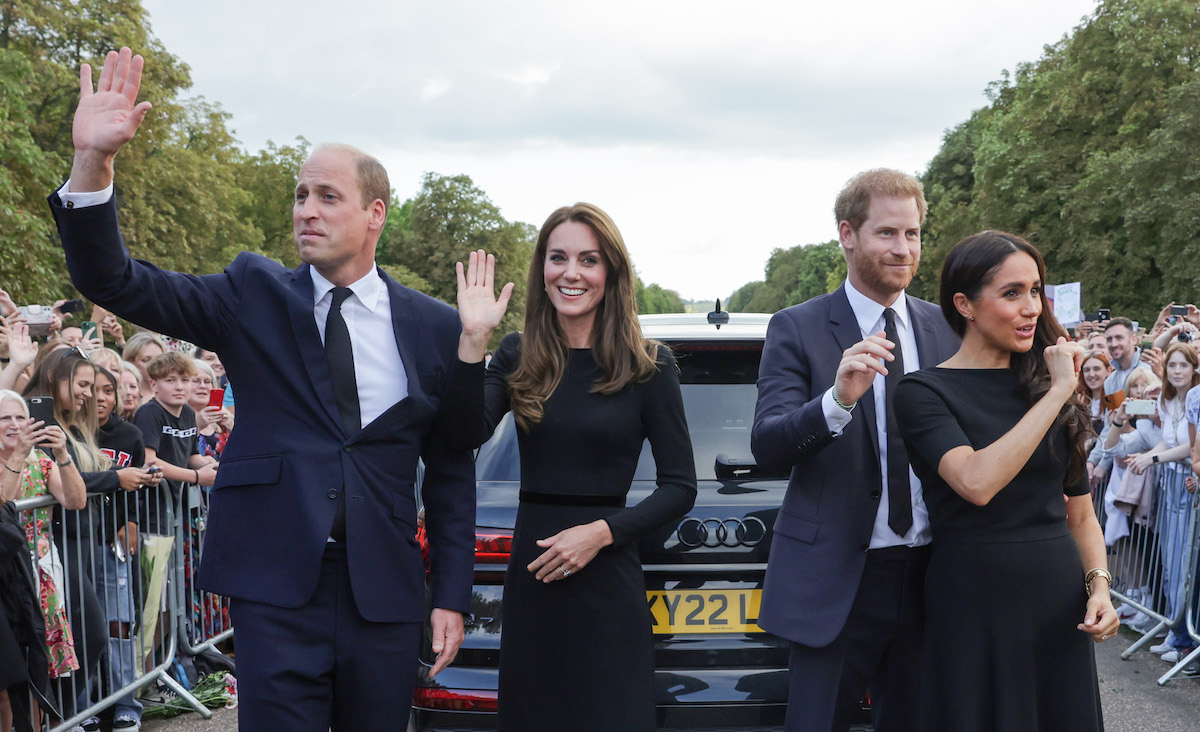 Prince William, Kate Middleton, Prince Harry, and Meghan Markle, who described her first meeting with Kate Middleton and hugging her sister-in-law in Netflix's 'Harry & Meghan' wave to crowds outside Windsor Castle