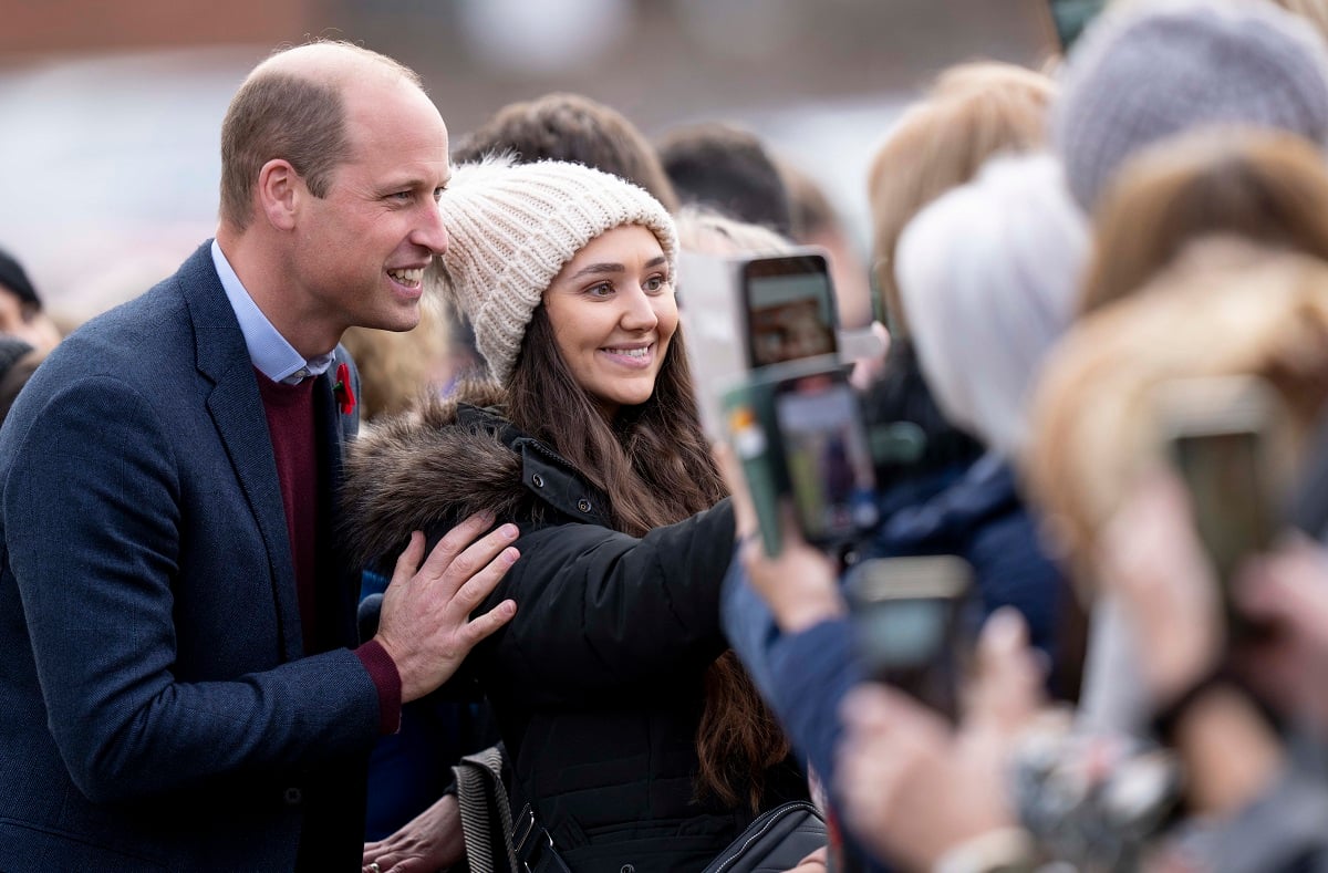 Prince William takes selfies with members of the public in Scarborough, England