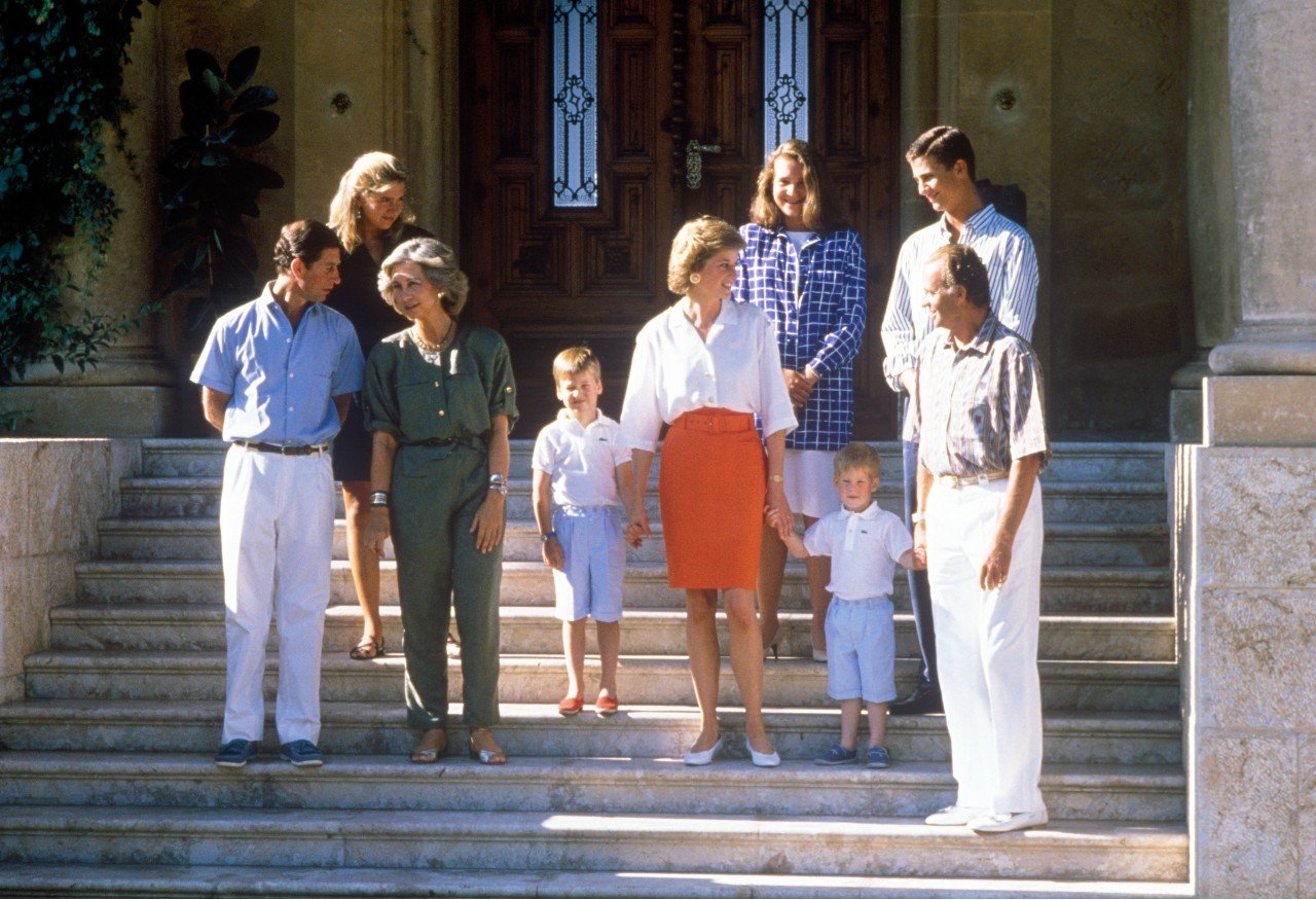 Princess Diana and King Charles spend time with the King of Spain in 1986.