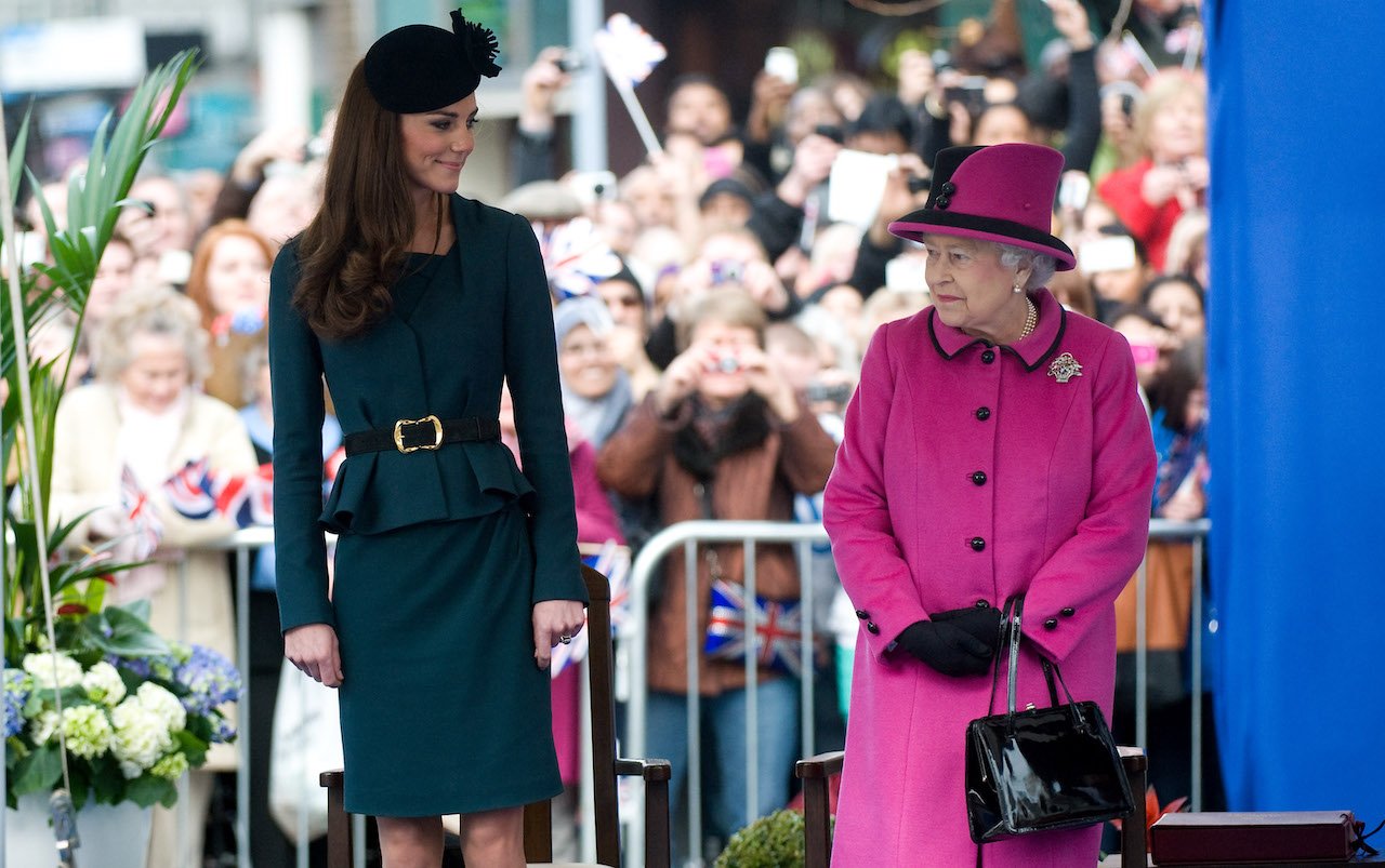 Kate Middleton and Queen Elizabeth II during their visit to Leicester on March 8, 2012, in Leicester, England.