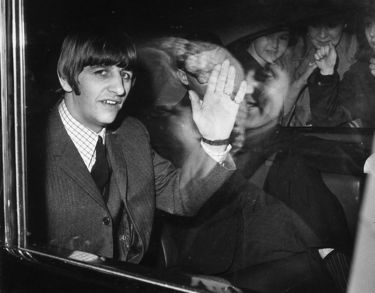 Ringo Starr, who once said he courted a very specific set of Beatles fans, waves from inside a car in 1964.