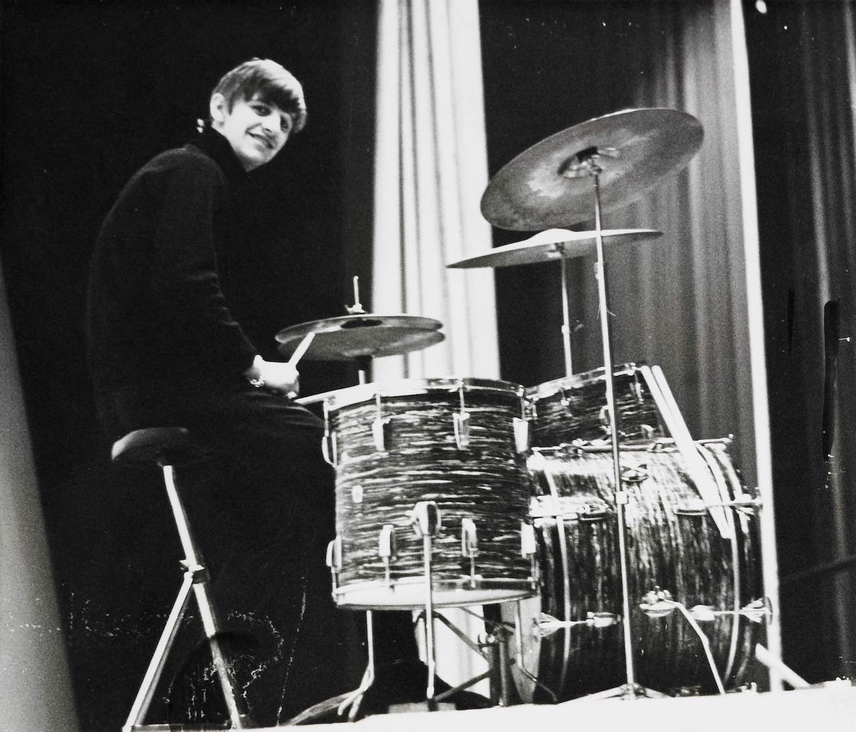 Ringo Starr, who rightly earned his praise from Elvis Presley's drummer, at his drum kit in 1963.