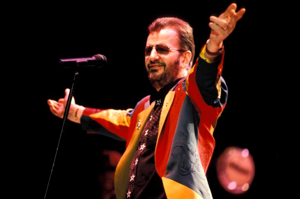 Ringo Starr, who had a classic reaction to one of his solo albums flopping, plays in concert in England in 1992.