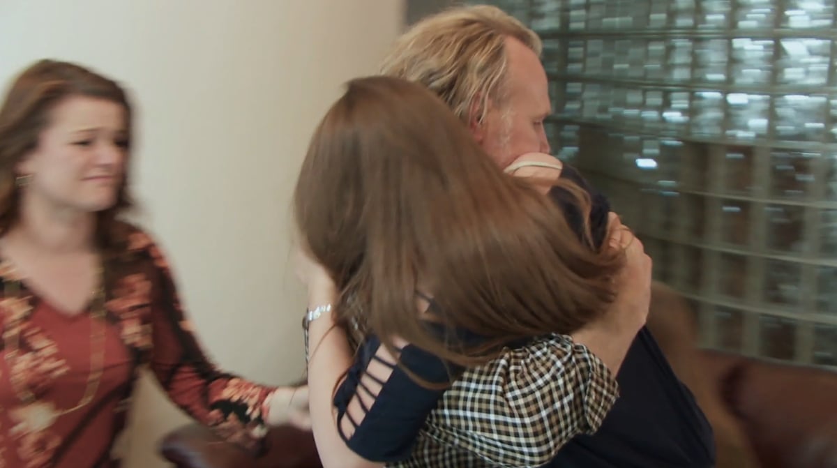Kody Brown carries his daughter, Aurora Brown upstairs after she had a panic attack on 'Sister Wives' Season 14 on TLC.