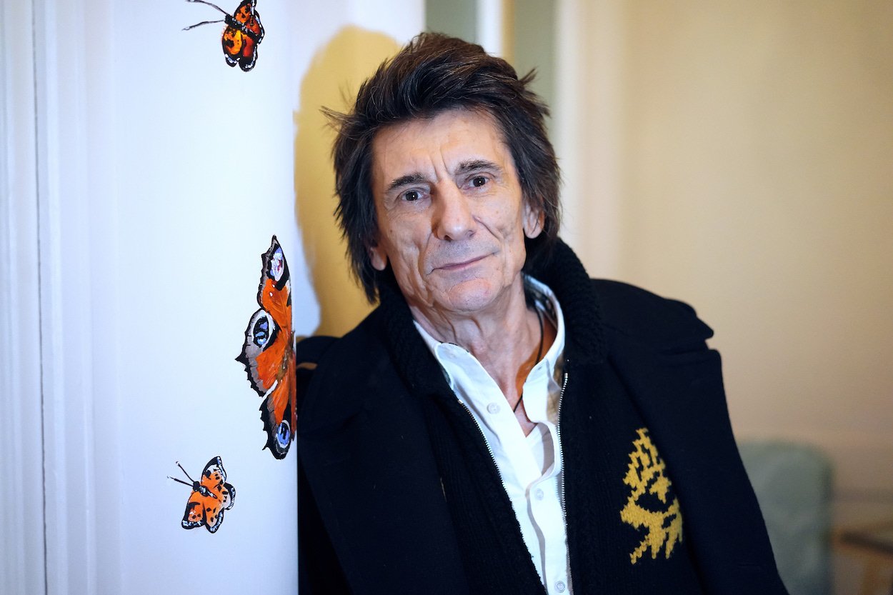 Rolling Stones guitarist Ronnie Wood attends an art exhibit by his daughter. Leah. Wood won a childhood contest that predicted his future music and art success.