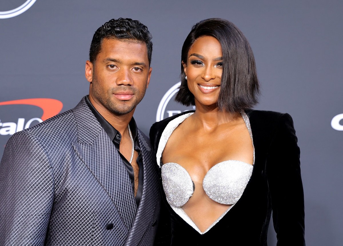 Russell Wilson and Ciara smile on the red carpet at the 2022 ESPYs