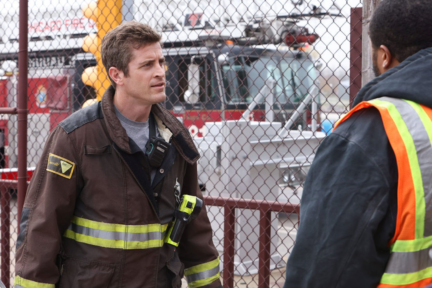 Sam Carver speaking to a city employee in 'Chicago Fire' Season 11 Episode 9