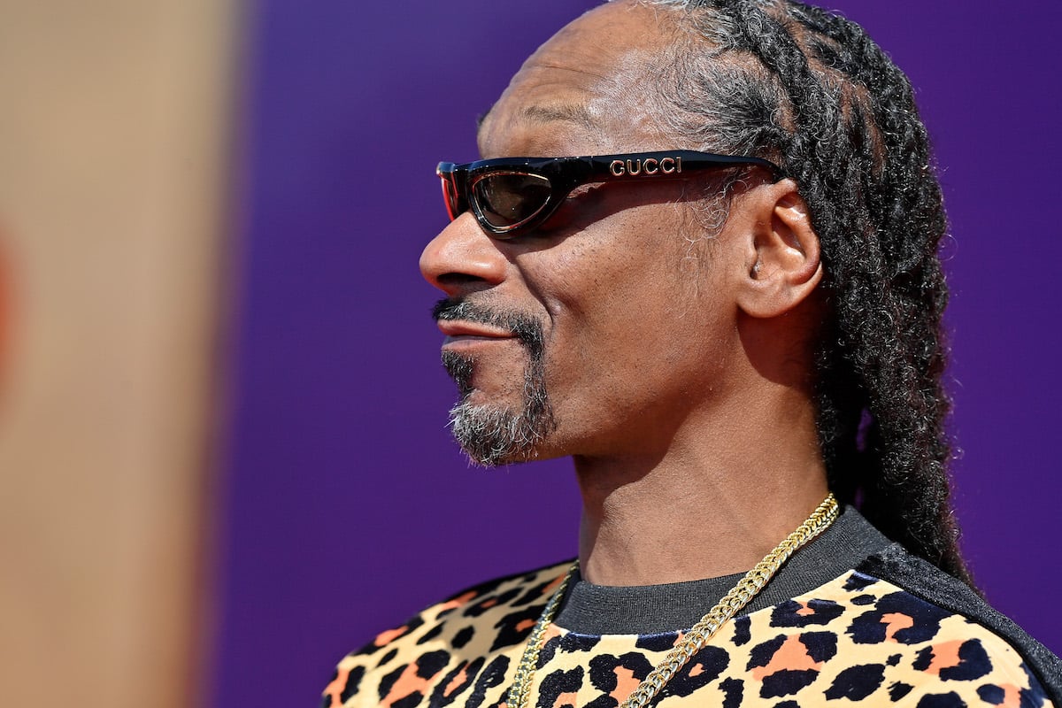 Rapper Snoop Dogg attends the 2022 MTV Movie & TV Awards in a leopard shirt