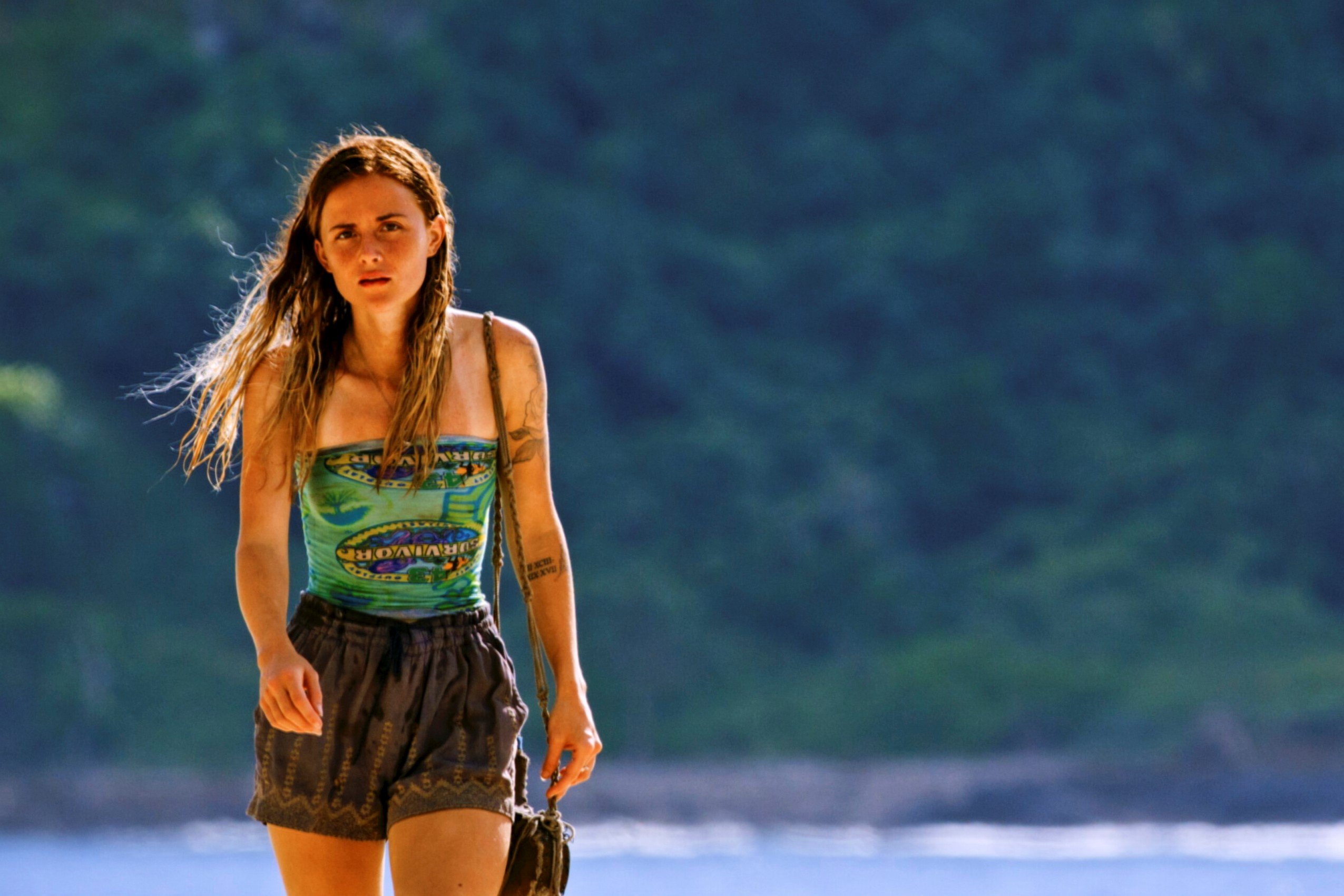 Cassidy Clark, who starred in 'Survivor 43' on CBS, wears her light blue 'Survivor' buff as a top and dark gray shorts.