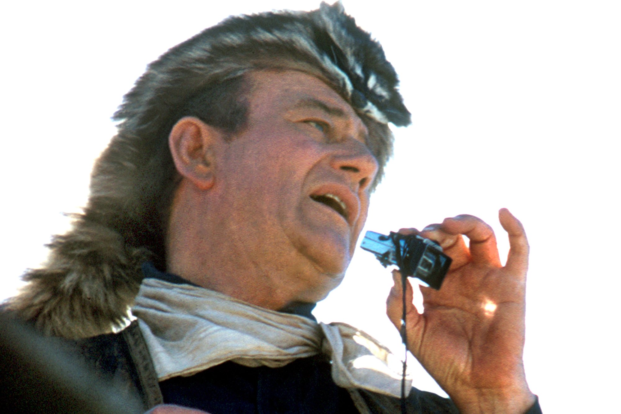 'The Alamo' John Wayne wearing an animal fur hat while he looks onward