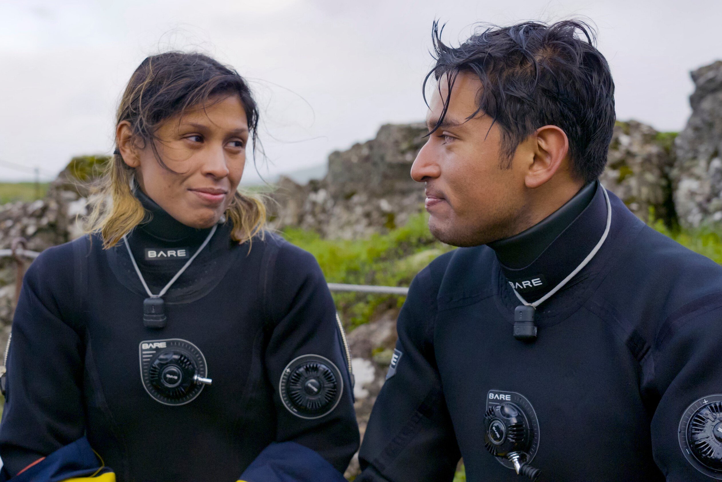 Aubrey Ares and David Hernandez, who starred in 'The Amazing Race 34' Episode 11 on CBS, wear black diving suits.
