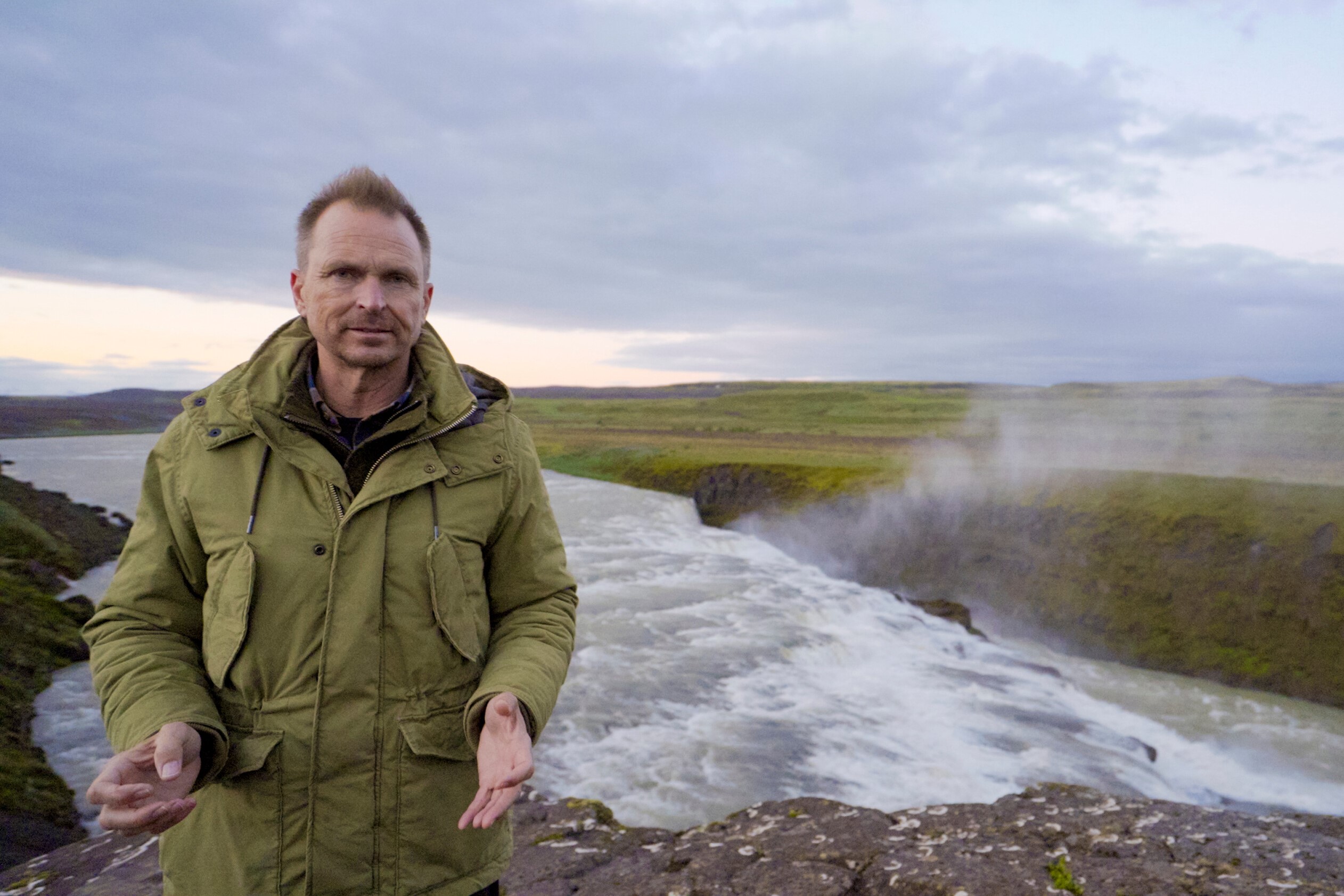 Phil Keoghan, who hosts 'The Amazing Race' on CBS, which contains various rules the contestants have to follow, wears an army green coat.