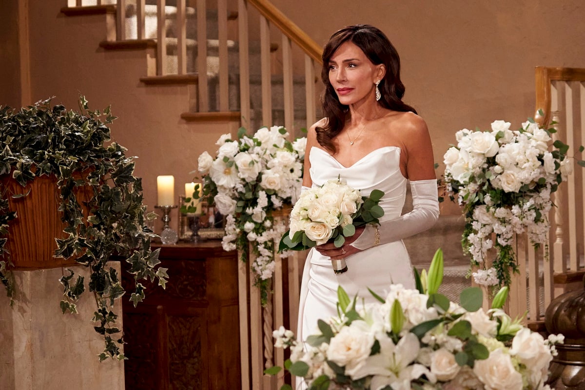 'The Bold and the Beautiful' star Krista Allen wearing a wedding dress in a scene for Taylor and Ridge's wedding.