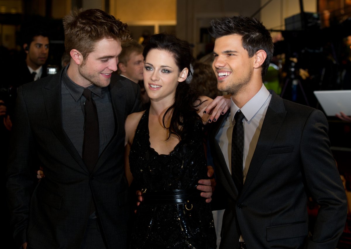 Robert Pattinson, Kristen Stewart and Taylor Lautner attend the UK premiere of The Twilight Saga: Breaking Dawn Part 1 at Westfield Stratford City on November 16, 2011 in London, England