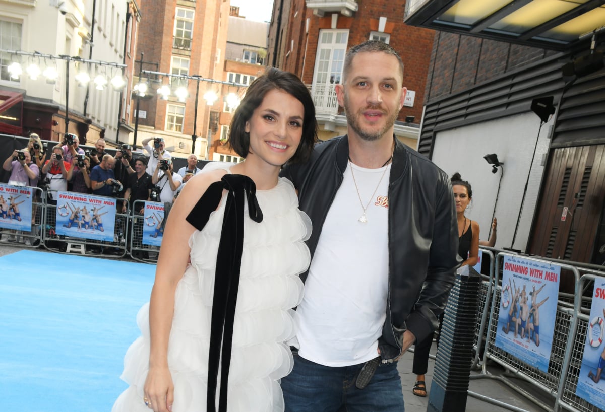 Tom Hardy and his wife Charlotte Riley attend the UK Premiere of "Swimming With Men' at The Curzon Mayfair on July 4, 2018 in London, England