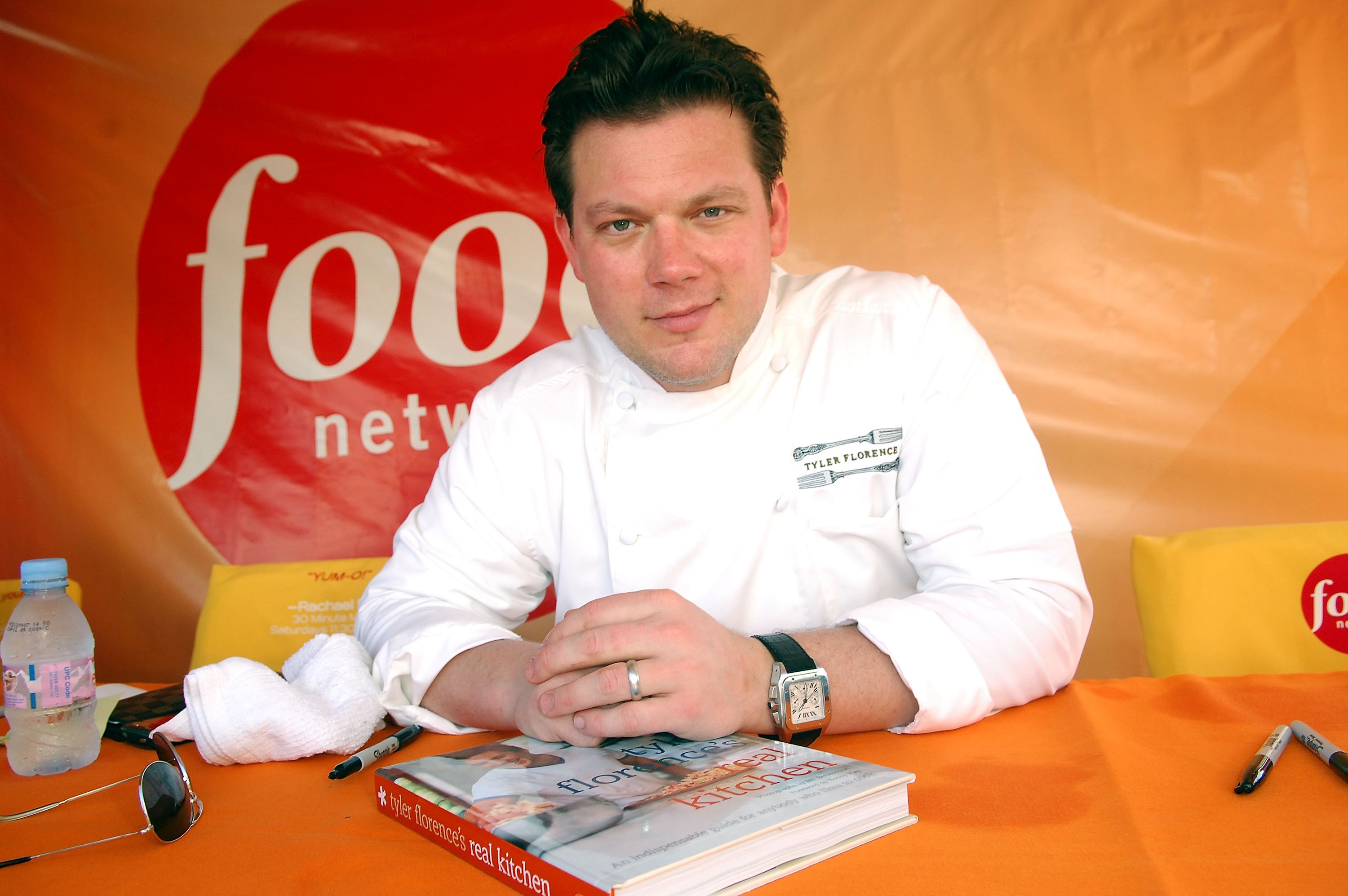 Tyler Florence signs books at the South Beach Wine and Food Festival on February 23, 2008 in Miami Beach, Florida