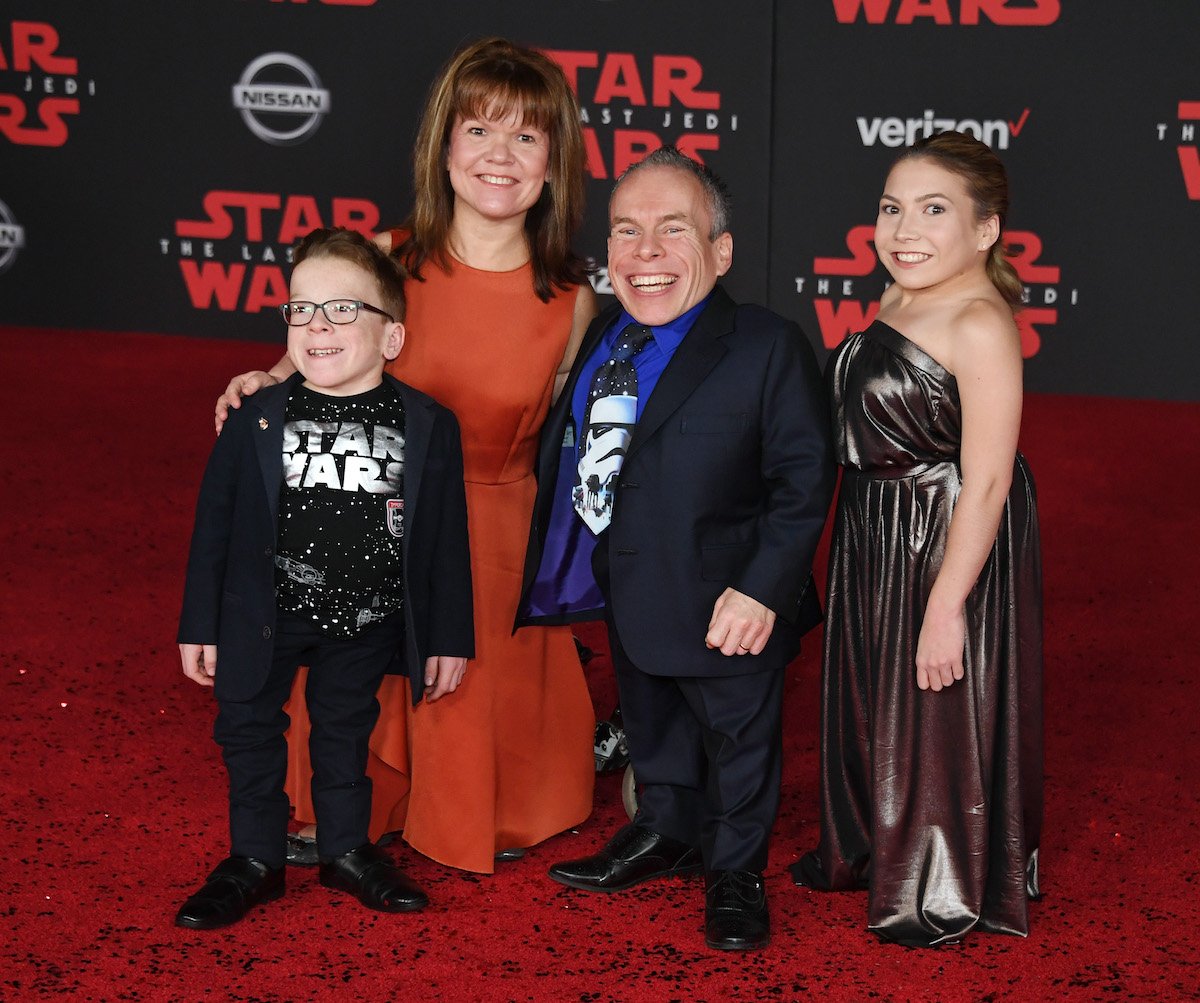 Actor Warwick Davis attends the 2017 premiere of Star Wars: The Last Jedi with his family, Harrison Davis, Samantha Davis, and Annabelle Davis