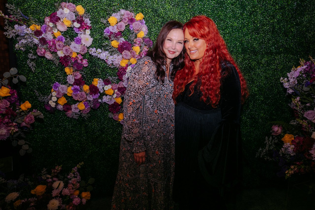 Ashley Judd and Wynonna Judd backstage for CMT's 'Coal Miner's Daughter: A Celebration of the Life & Music of Loretta Lynn' at Grand Ole Opry on October 30, 2022, in Nashville, Tennessee.