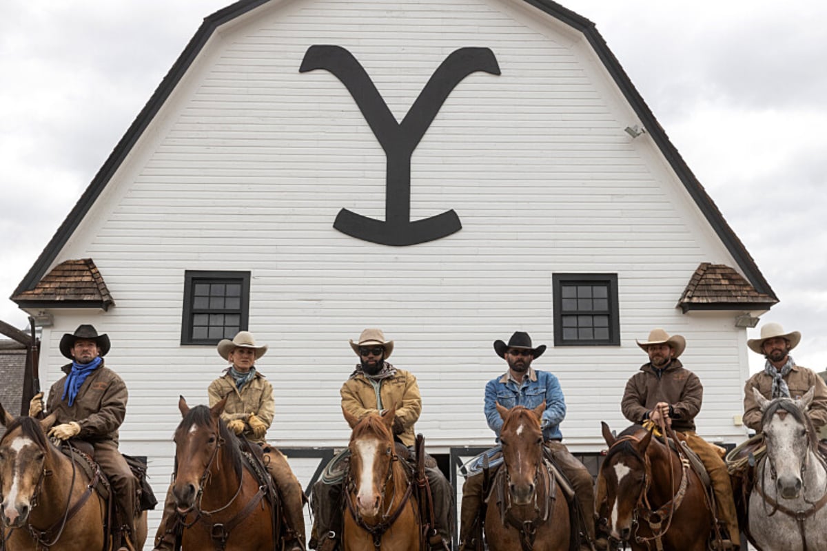 Who dies in Yellowstone Season 5? the ranch hands wait on horses outside the bunkhouse.