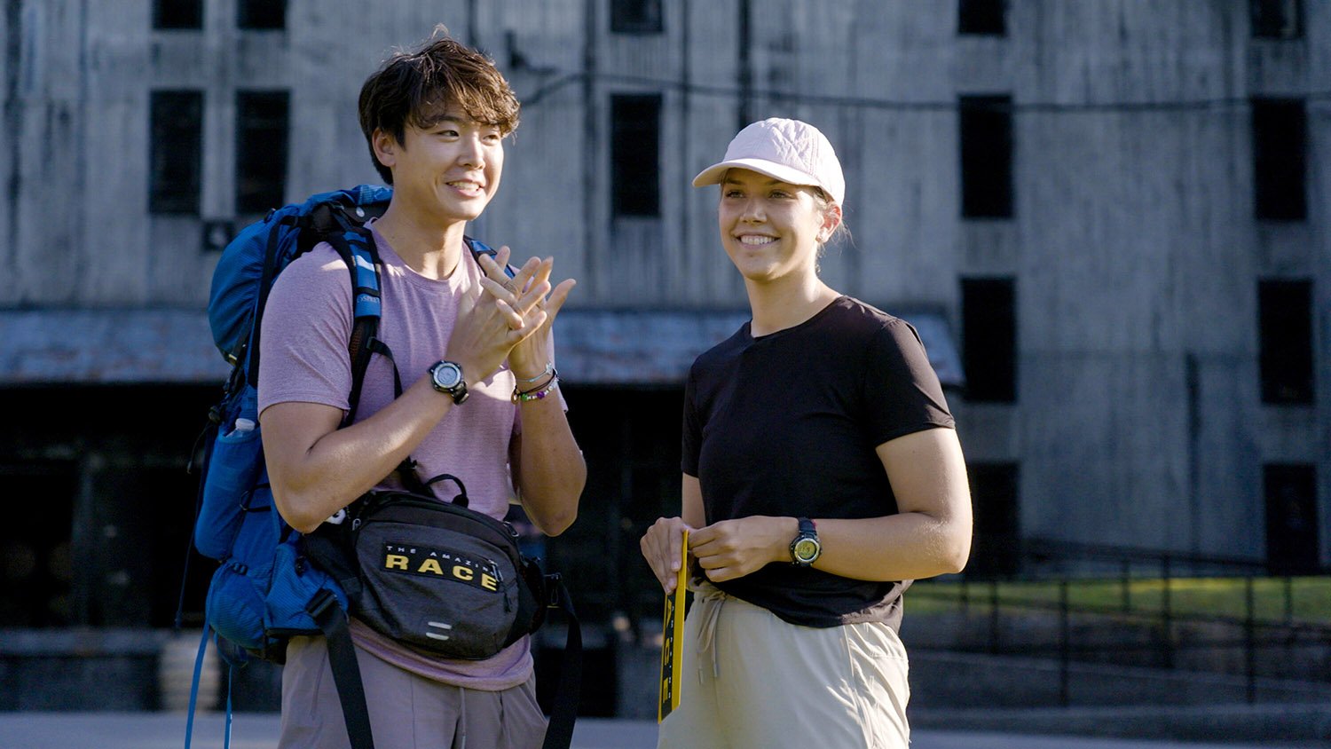 Derek Xiao and Claire Rehfuss smile in the last leg of The Amazing Race 34