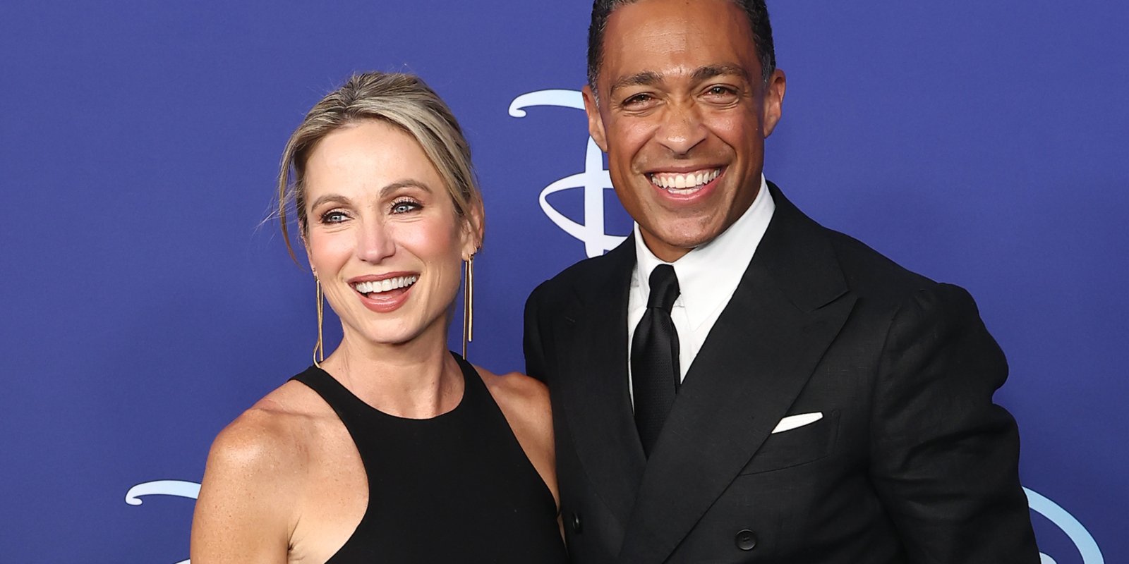 Amy Robach and TJ Holmes attend the 2022 ABC Disney Upfront at Basketball City - Pier 36 - South Street on May 17, 2022 in New York City.