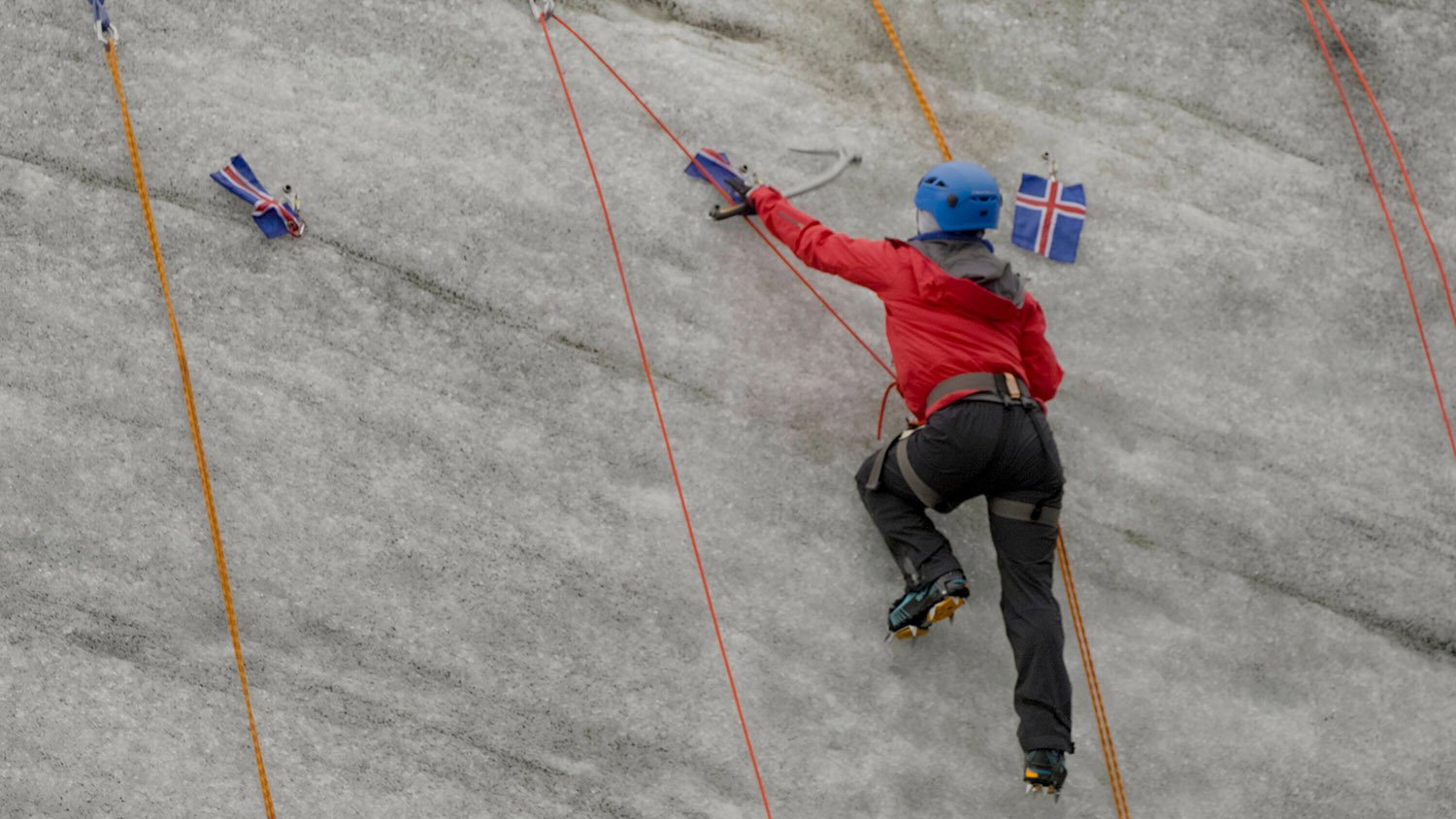 Aubrey Ares scales a glacier in Iceland on The Amazing Race 34 as part of a challenge with her teammate, David Hernandez.