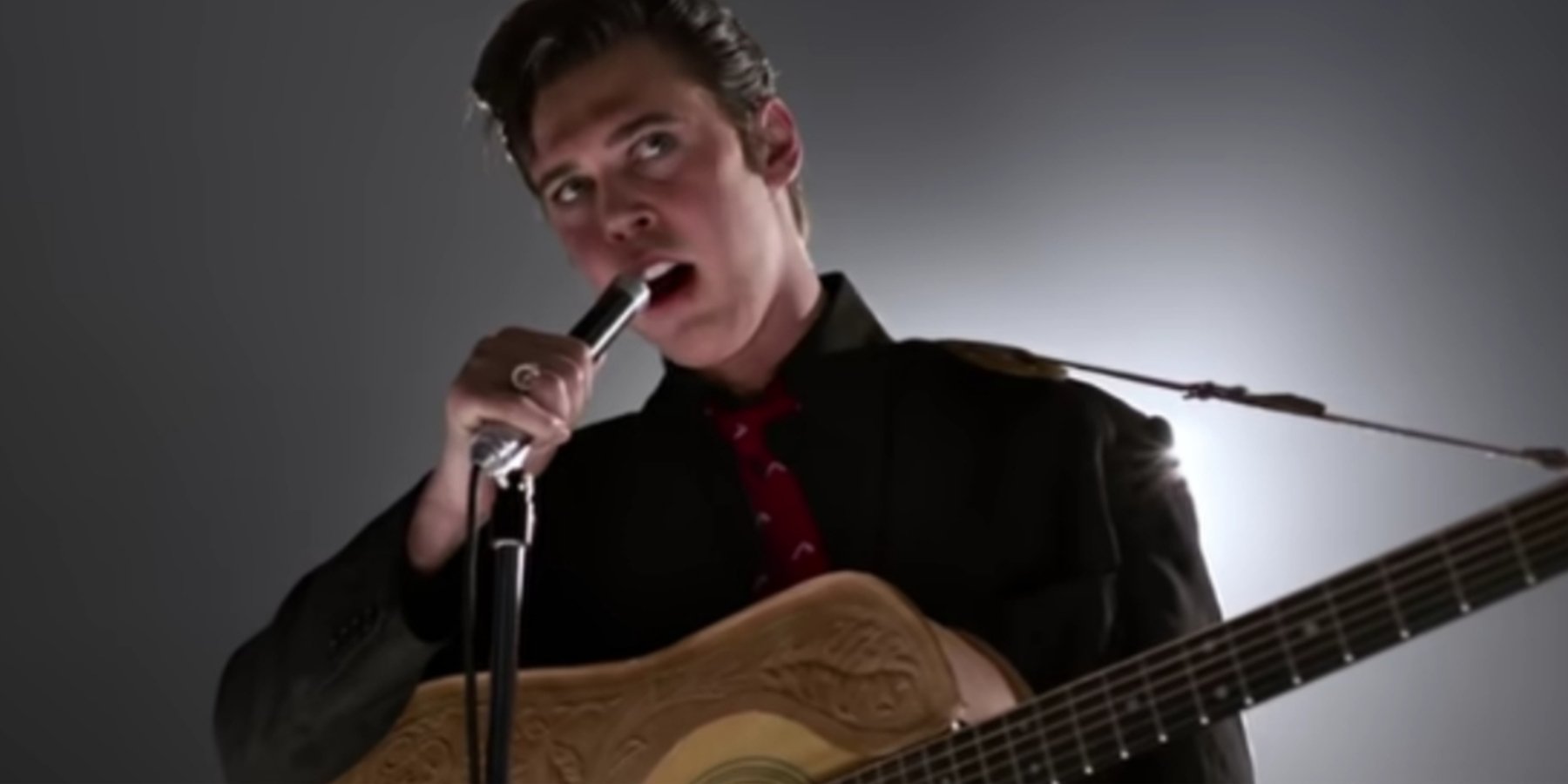 Austin Butler plays Elvis Presley in the motion picture Elvis.