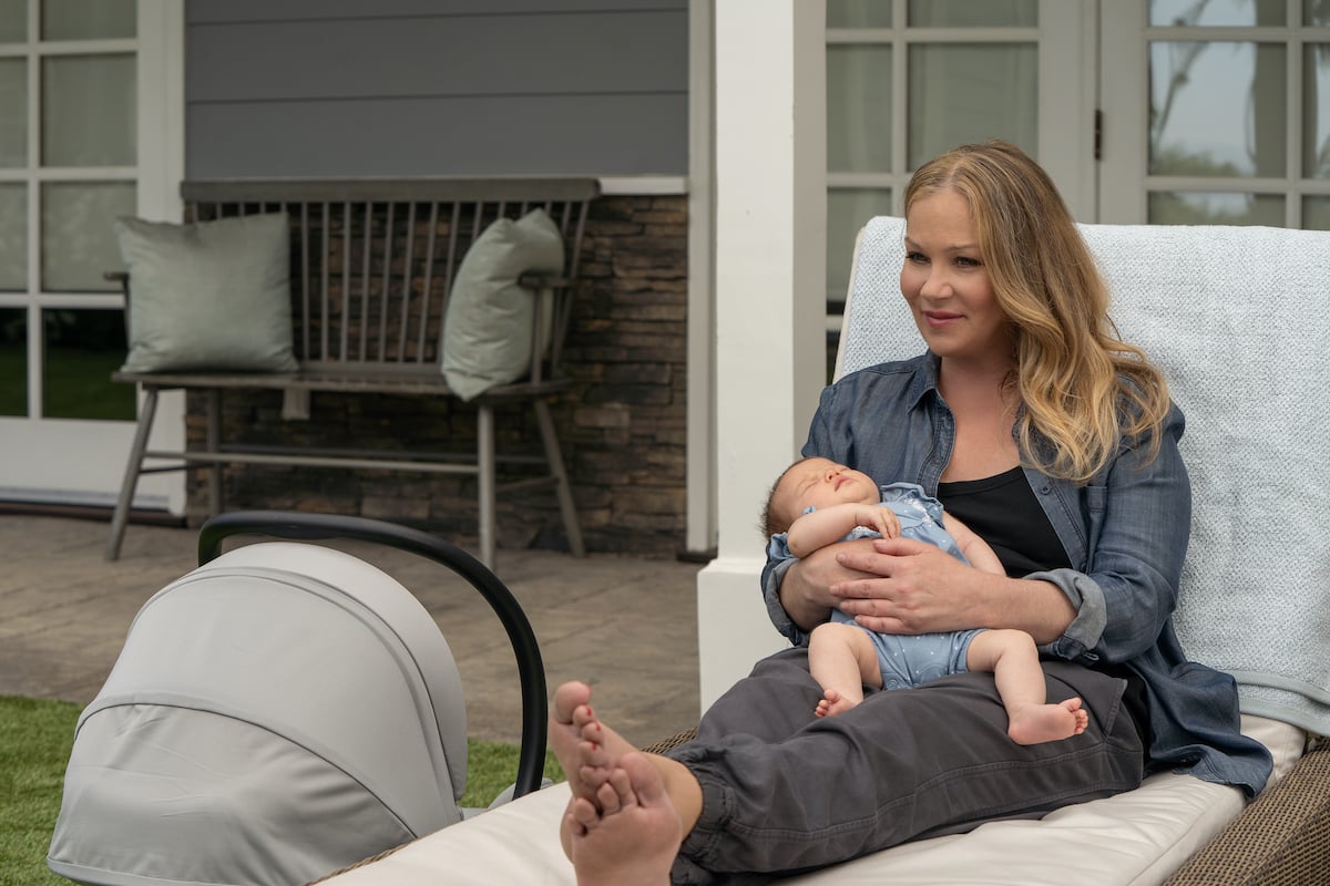 Jen (Christina Applegate) holding baby Joey in 'Dead to Me' Season 3