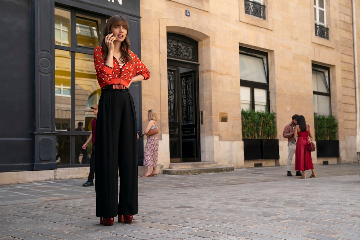 Lily Collins in front of the Galerie Patrick Fourtin where 'Emily in Paris' Season 3 filmed