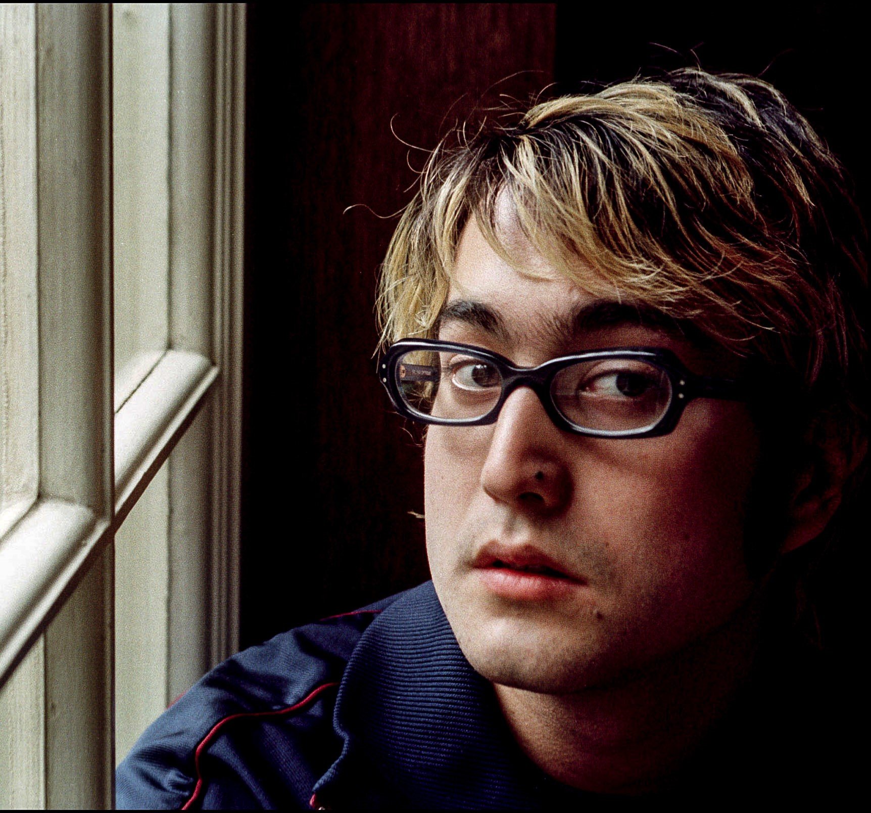 John Lennon’s son, Sean Ono Lennon, wearing glasses