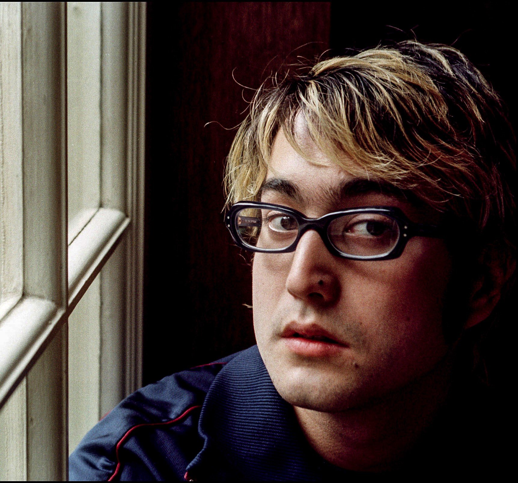 John Lennon's son, Sean Ono Lennon, near a window
