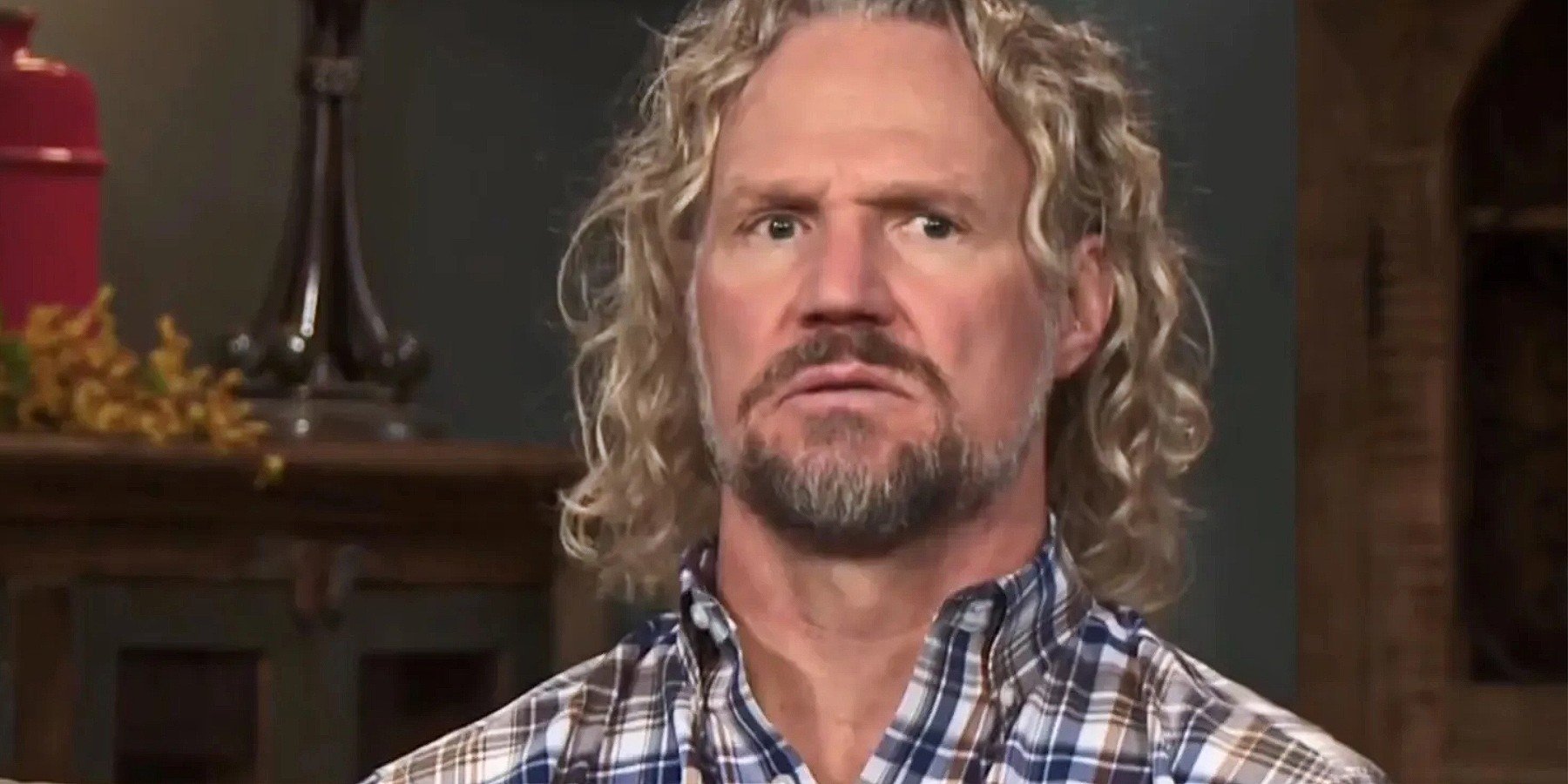 Kody Brown is seated in a confessional interview for TLC's 'Sister Wives.'