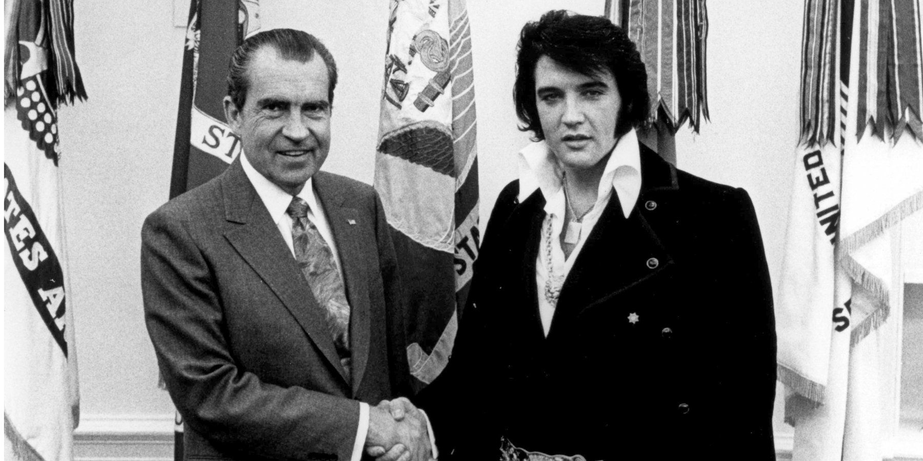 Richard Nixon and Elvis Presley shake hands in the Oval Office of The White House in 1970.