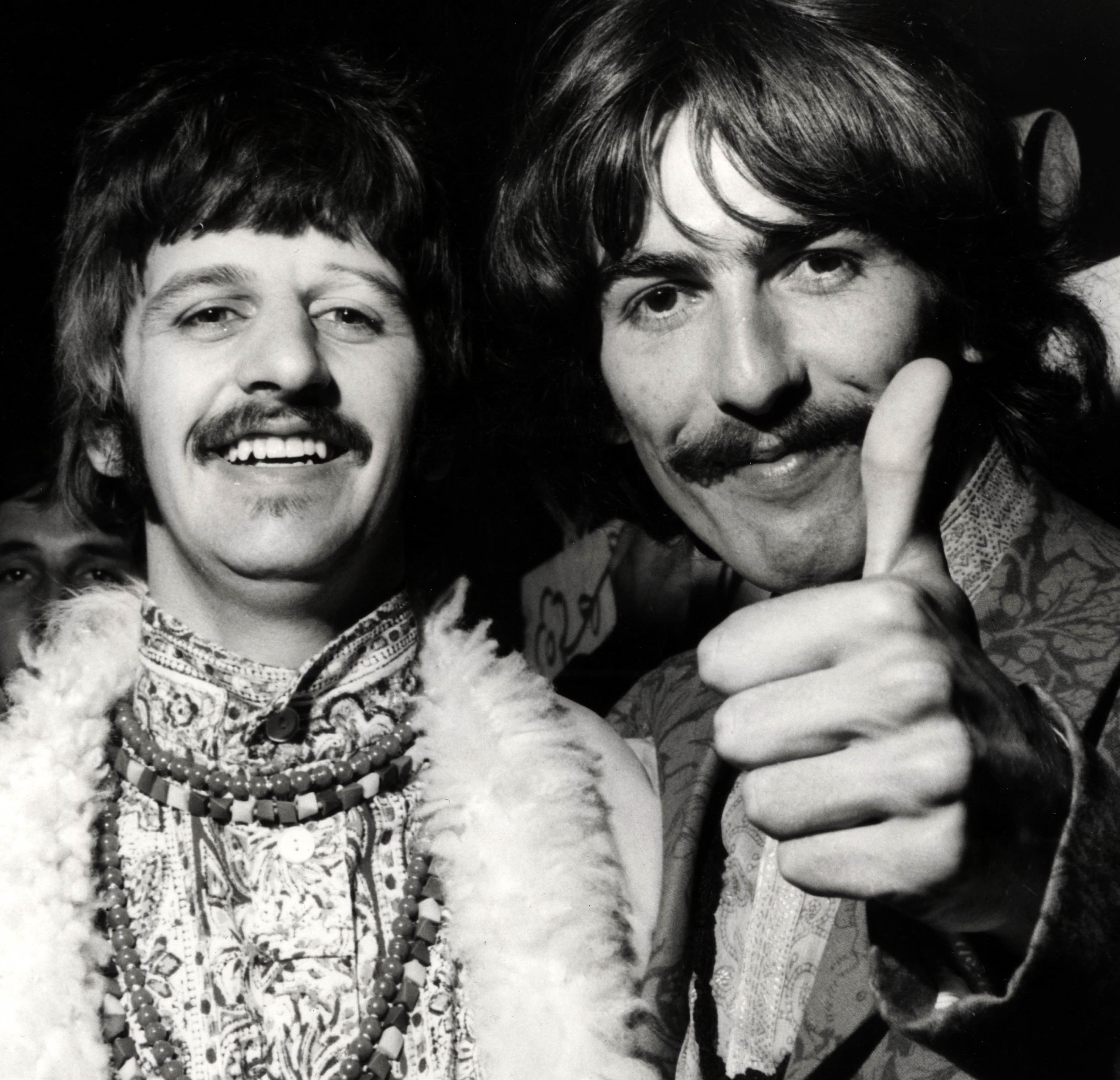 The Beatles' Ringo Starr and George Harrison in black-and-white